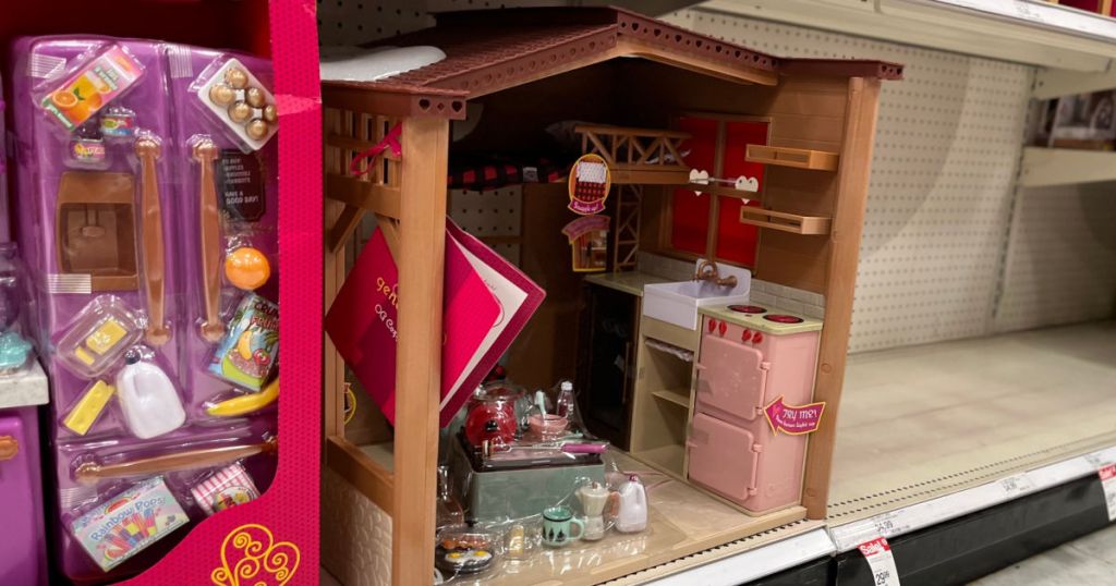 toy doll cabin on shelf