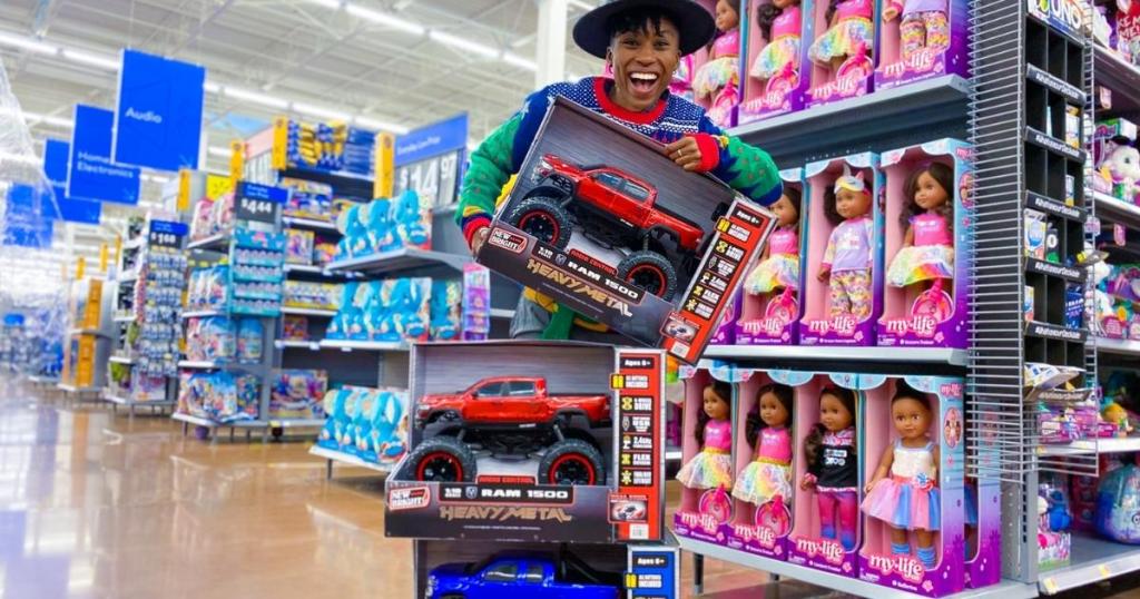 woman holding new bright radio controlled toy trucks