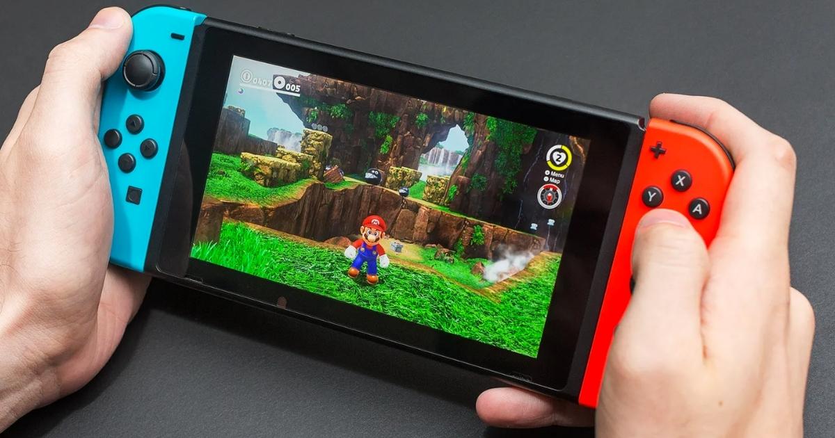 nintendo switch with mario game on screen