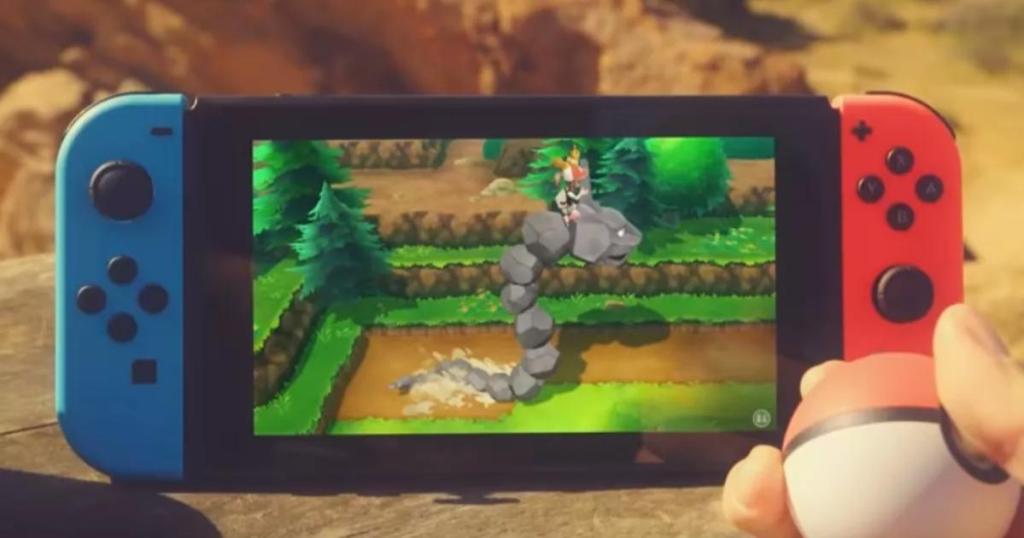 nintendo switch console with pokemon game on screen