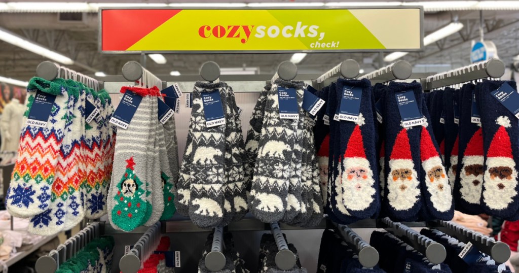 Old Navy Cozy Socks Display featuring holiday designs