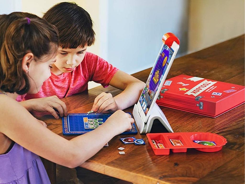 kids playing with osmo math wizard and the amazing airships game