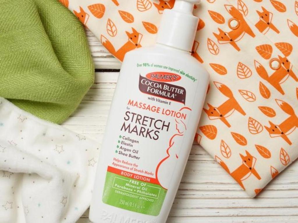 palmer's cocoa butter formula massage lotion for stretch marks with baby fabrics