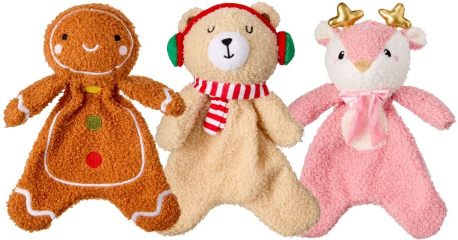 Several Christmas-themed stuffed toys