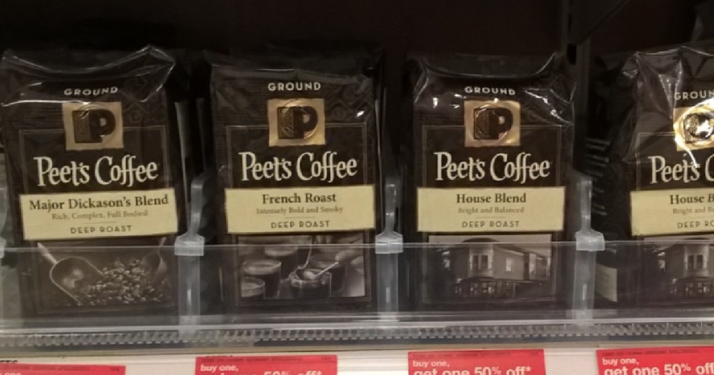 brown bags of ground coffee on shelf