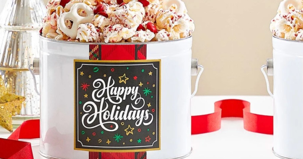 Peppermint Popcorn Tin with Happy Holidays on front