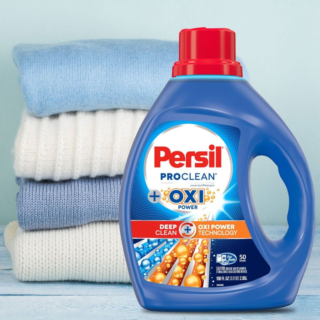 Persil Proclean + Oxi Detergent in front of towels