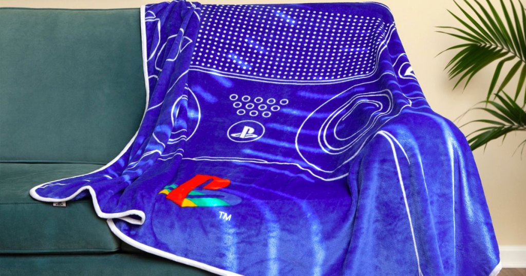 blue playstation controller throw blanket on couch