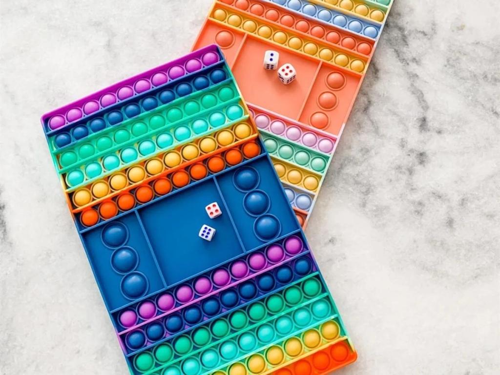 pop it multi colored board games with dice