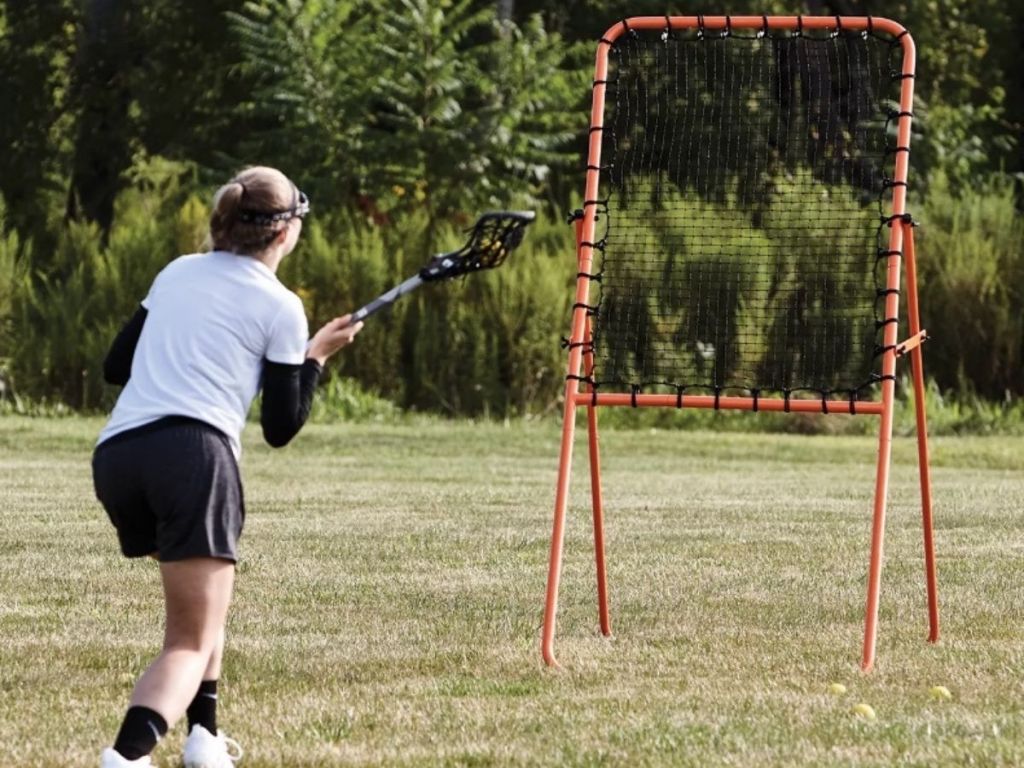 girl using Powerbolt Lacrosse Net