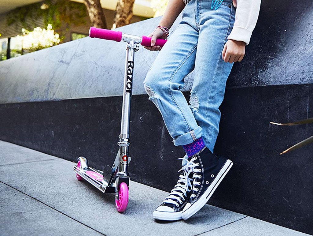 girl with pink razor scooter
