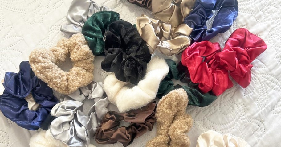 pile of scrunchies on a bed