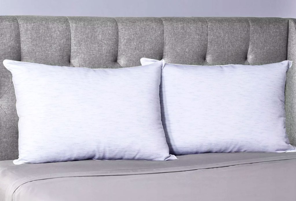 two pillows on a bed