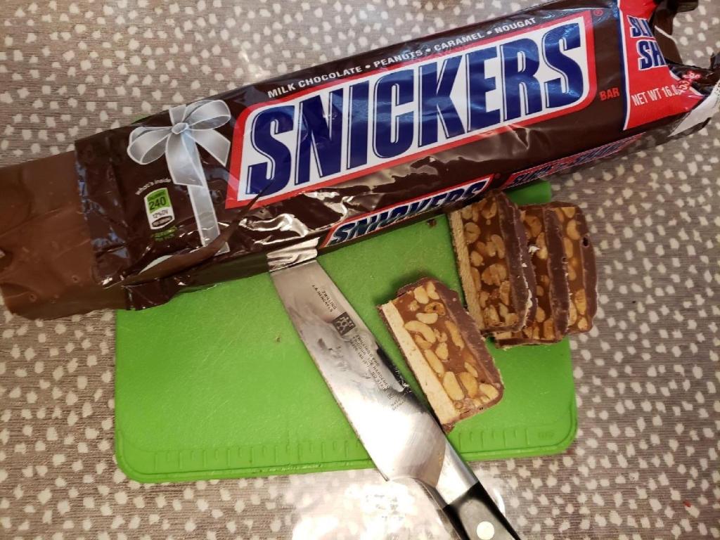 Snickers Share Candy Bar on cutting board
