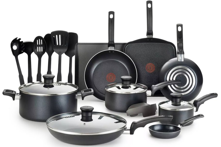 black cookware set with set of utensils