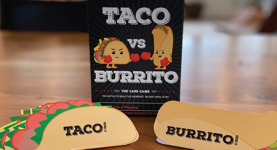Taco vs Burrito Game box and cards sitting on table
