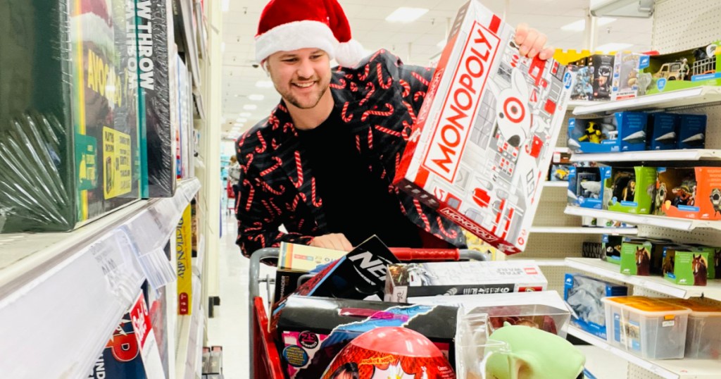 man loading a shopping cart full of toys when is black friday
