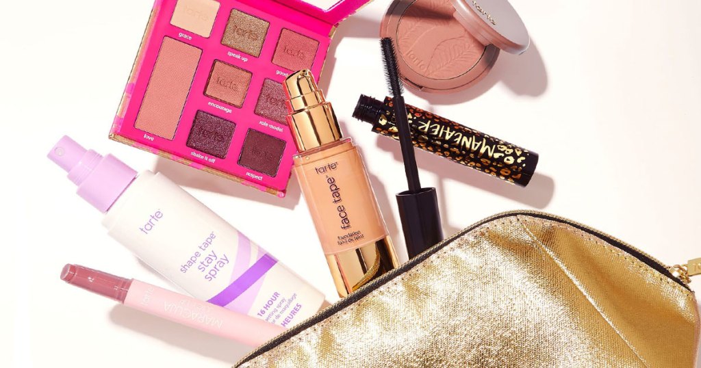 tarte products coming out of gold makeup bag