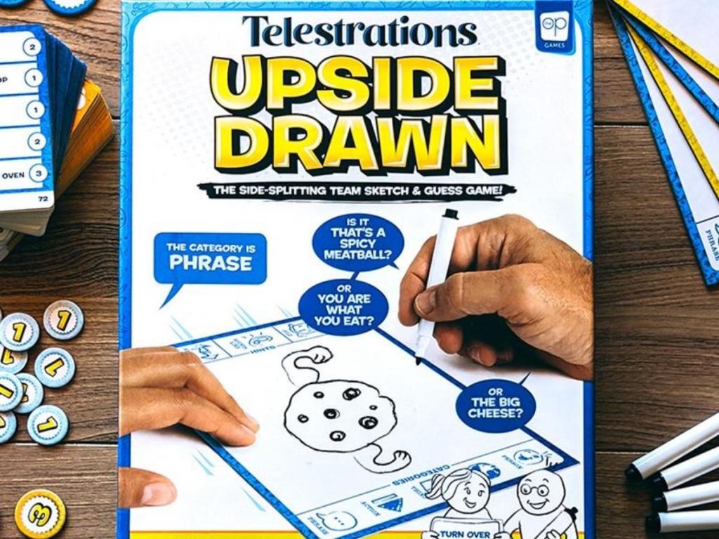 telestrations upside drawn group game with pieces and box