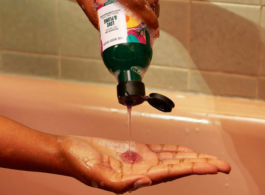 pouring shower gel into hand