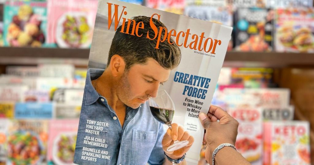 hand holding up Wine Spectator magazine