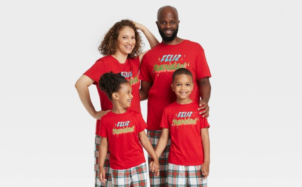 family wearing Wondershop Feliz Navidad Shirts