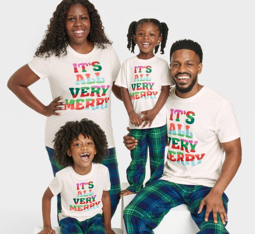 family wearing Wondershop Very Merry Tees
