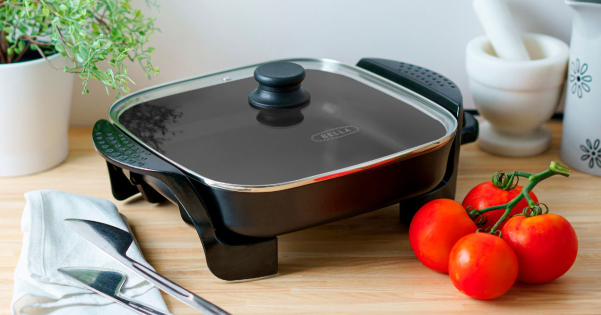 Non-Stick Electric Skillet on table with tomatoes next to it