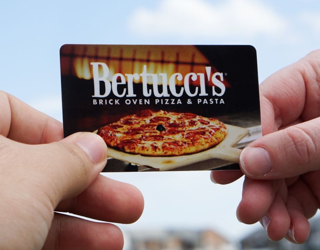 holding a Bertucci's gift card
