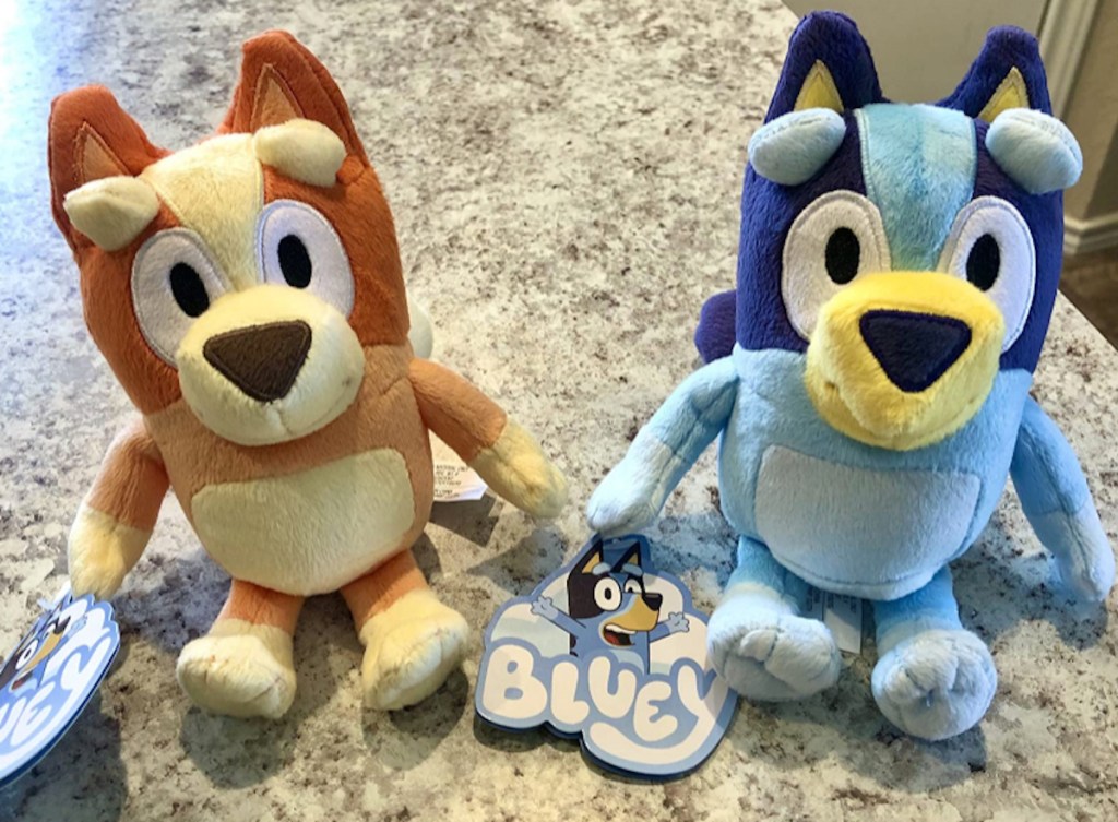 brown and blue bluey stuffed toys on countertop - hot toys for christmas