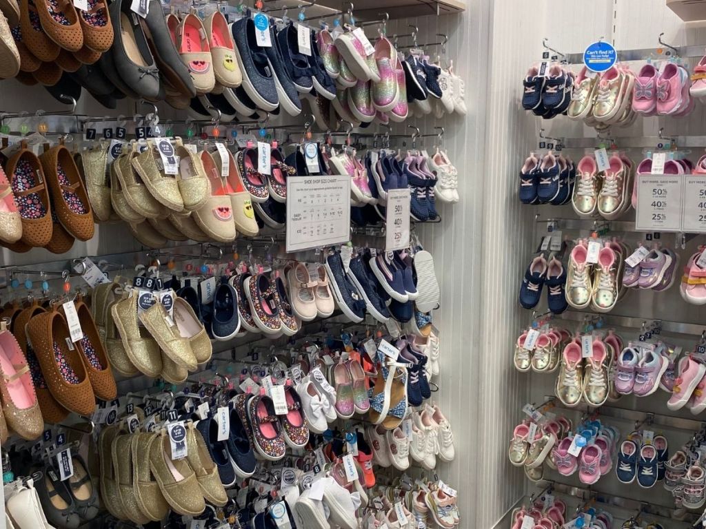 Carter's shoes hanging in store