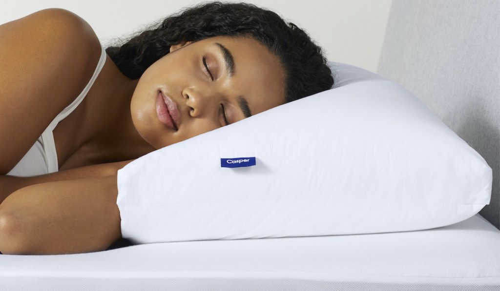 woman sleeping on casper pillow