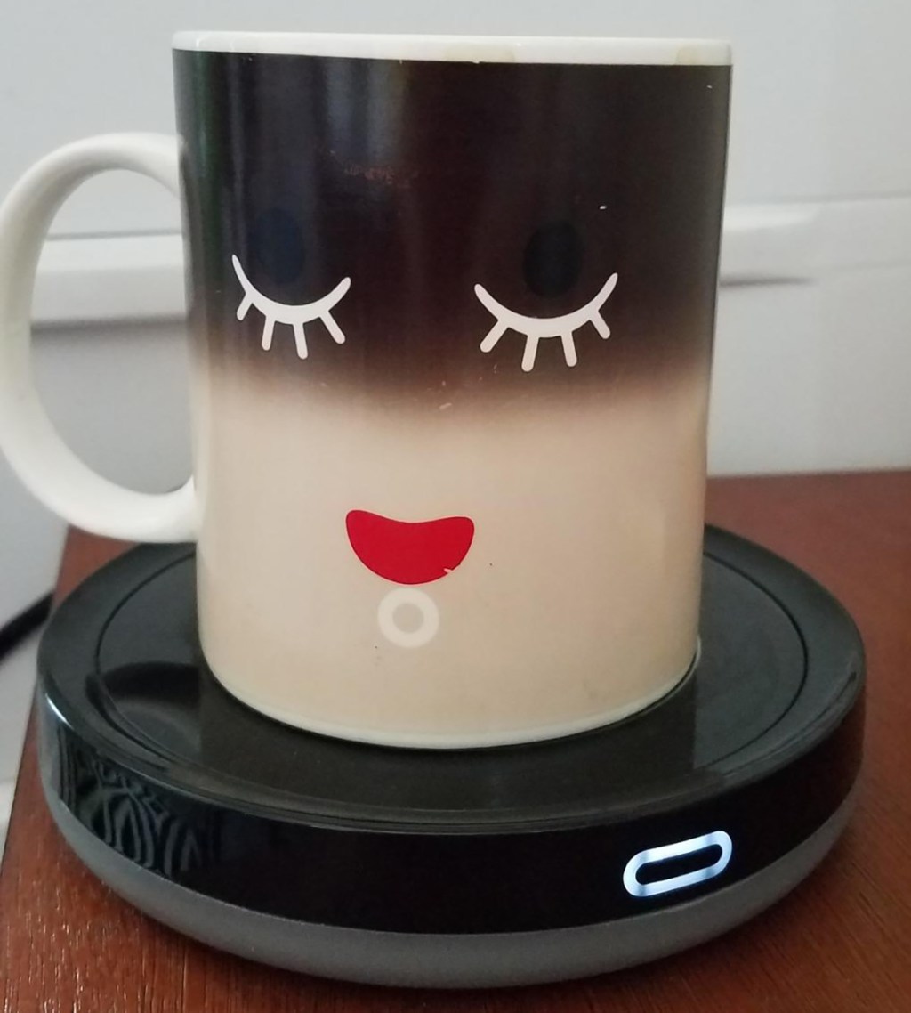 mug on top of coffee mug candle warmer plate