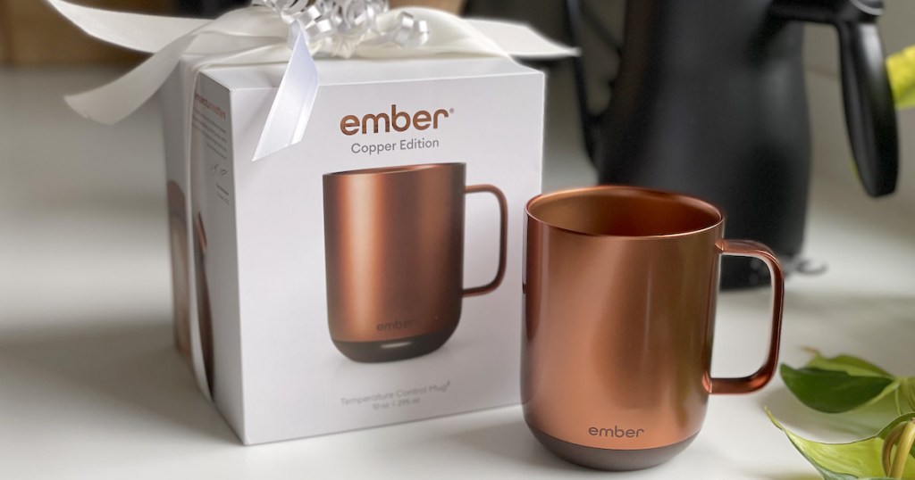 copper colored ember coffee mug with box sitting on kitchen counter