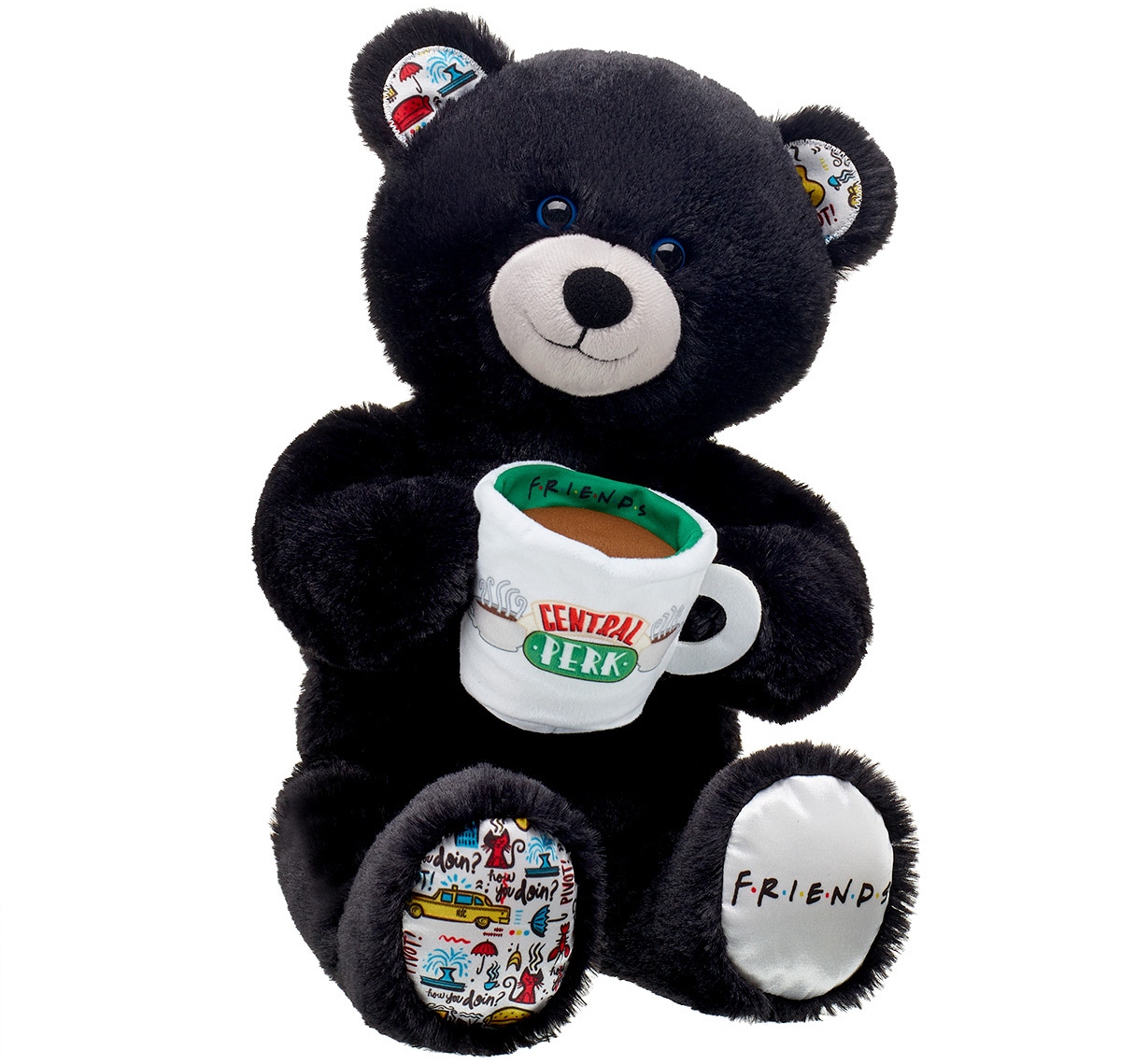 Friends Build A Bear holding plush mug