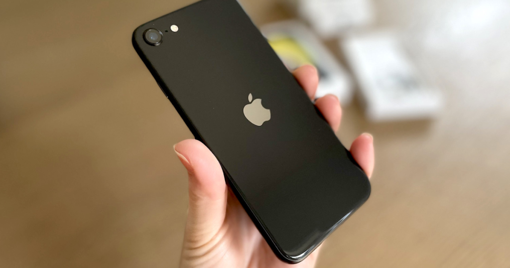 hand holding black apple iphone case