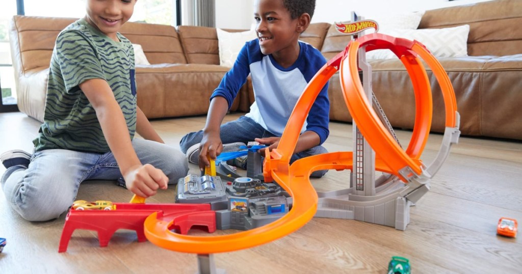kids playing with hot wheels spin storm track