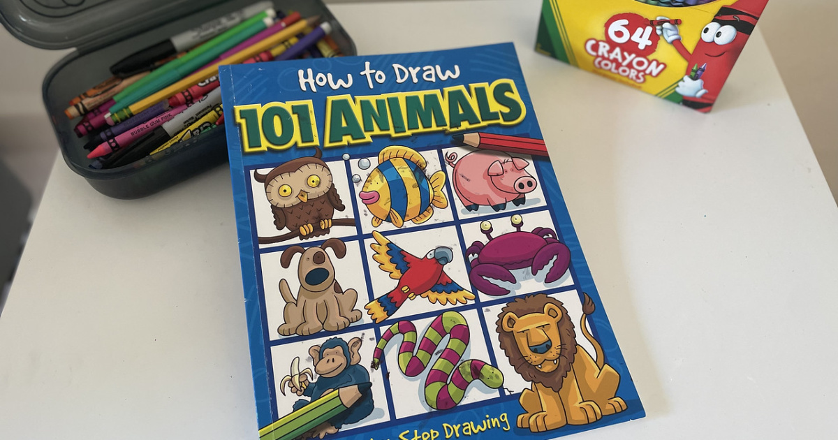 how to draw 101 animals book next to crayons