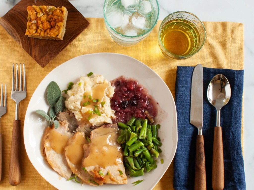thanksgiving dinner served on yellow placemat