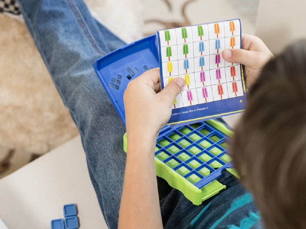boy playing a puzzle game