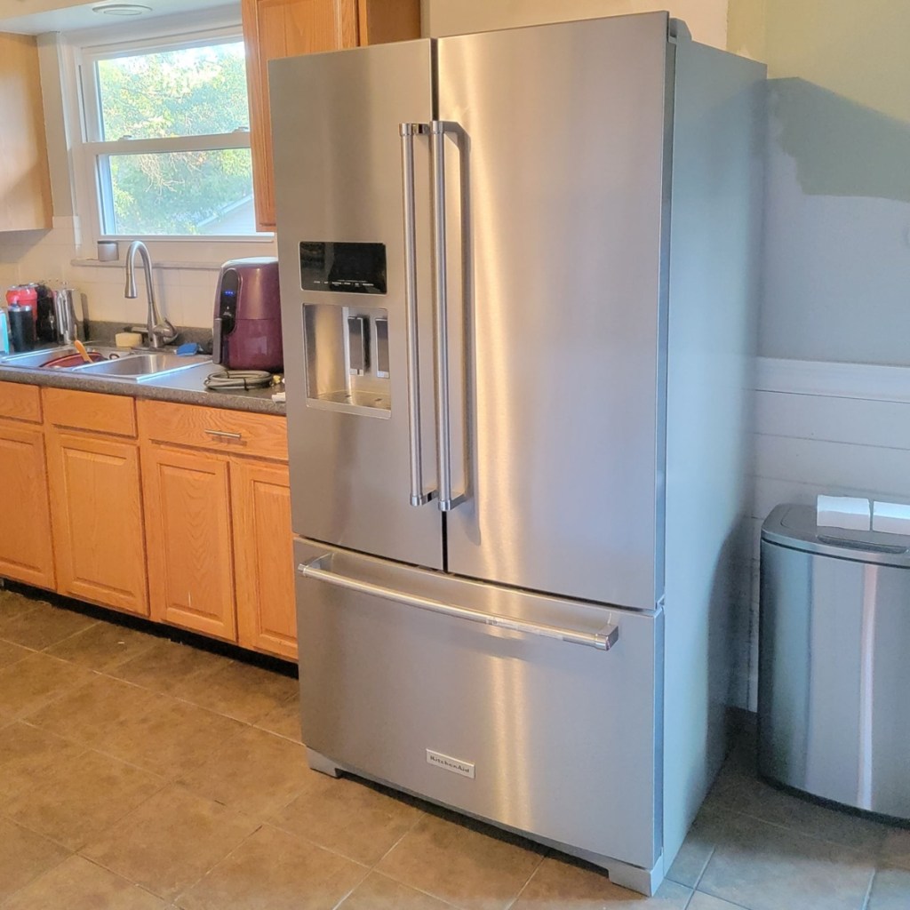 stainless steel refrigerator in kitchen