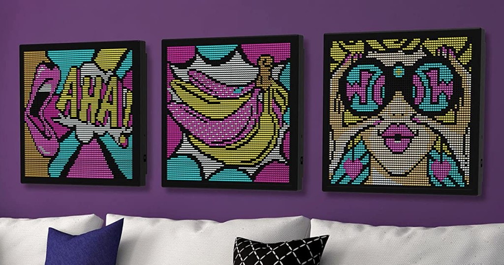 3 Lite Brite wall art designs hanging above couch
