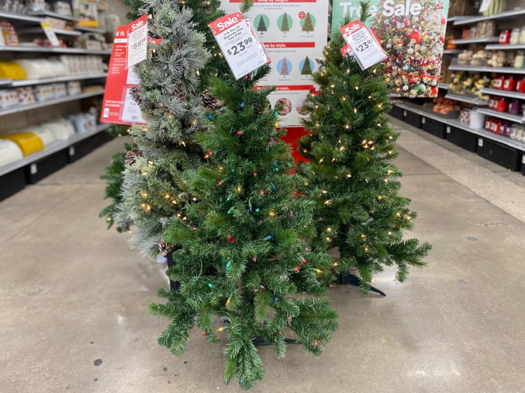 prelit christmas trees in store 