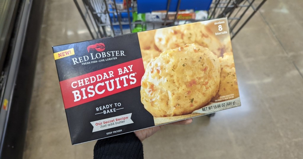 holding frozen box of Red Lobster cheddar bay biscuits