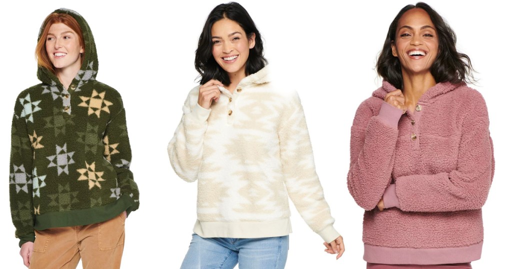 three women wearing sherpa hoodies