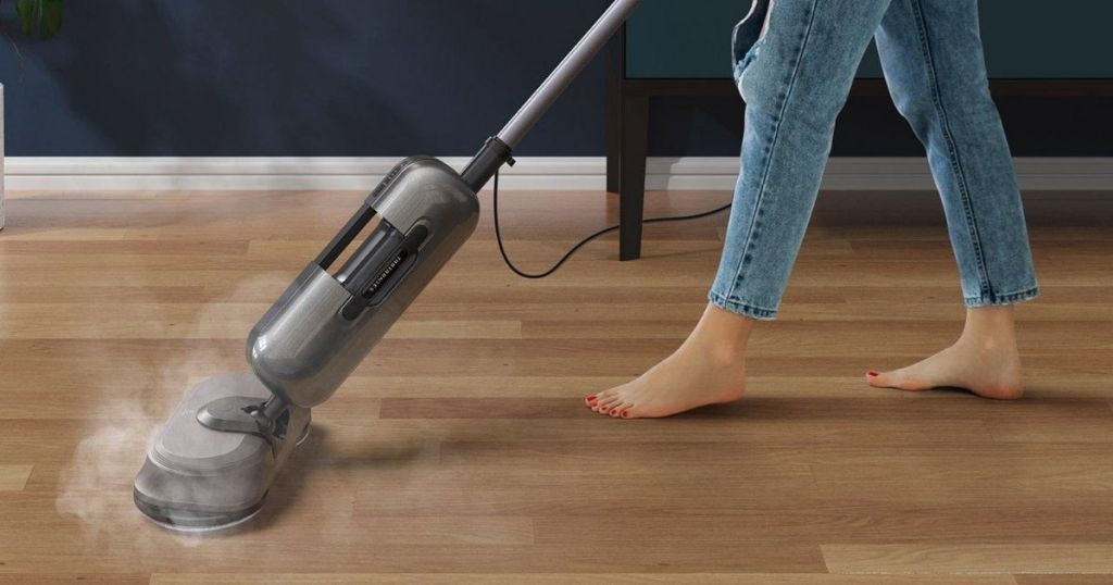 woman using steam mop