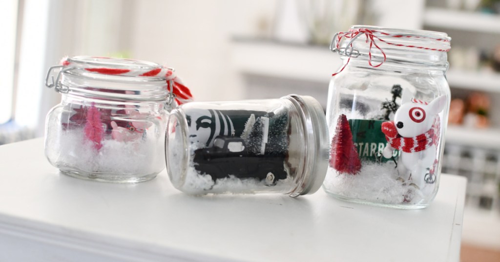 three gift cards in a jar