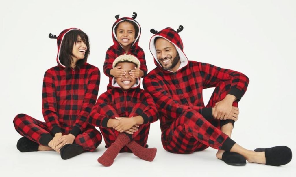 family of four wearing hooded moose buffalo plaid best matching family pajamas