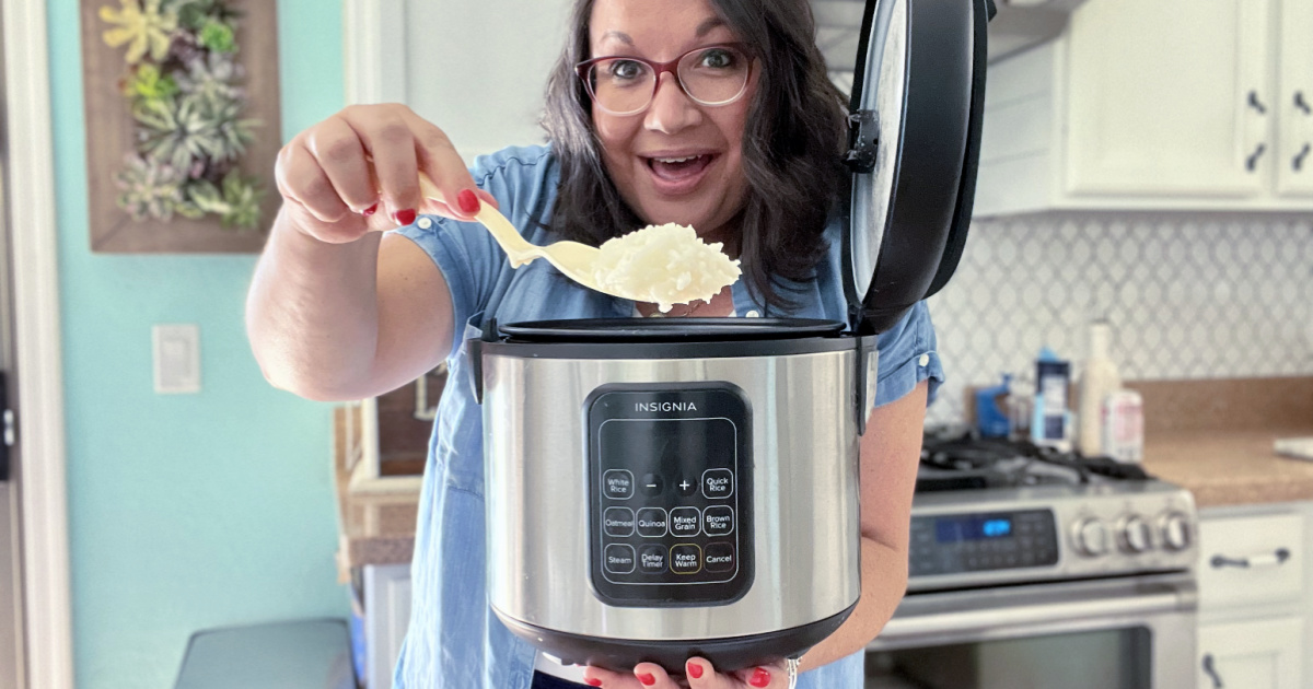 woman using insignia rice cooker