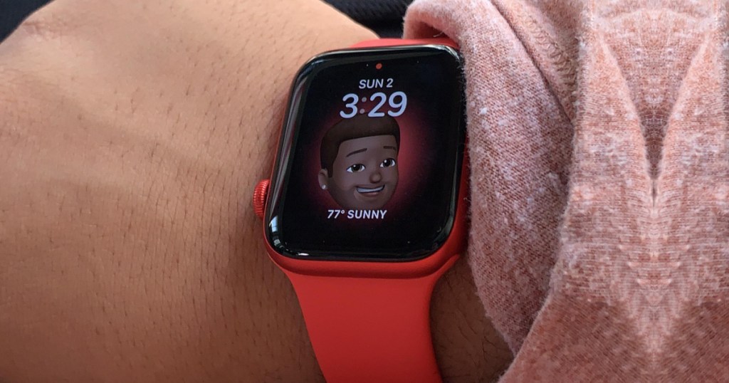 red smartwatch on wrist